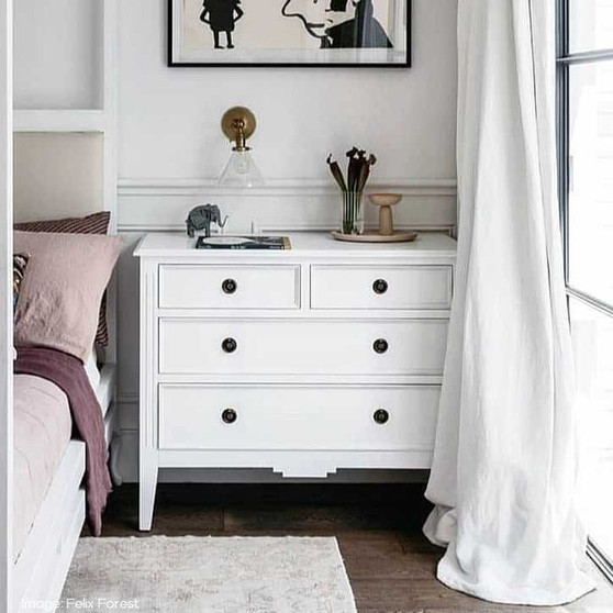 Front view of the Peninsula 4 Drawer Chest in white, embodying understated elegance for sophisticated interiors.