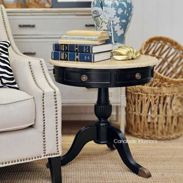 The Cobble Hill Round Table from Canalside Interiors, in sleek black with limewash highlights, is the embodiment of modern coastal sophistication for your bedroom decor