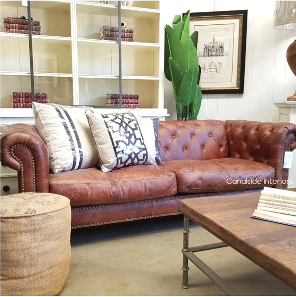 Front view of the Pasadena 2-Seater Chesterfield with waxed aged leather - A timeless piece for modern living rooms.