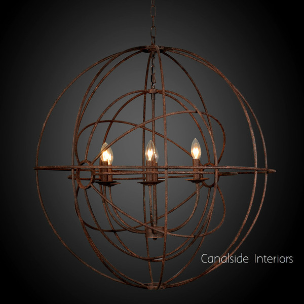 Illuminate your living room with the Foucault Twin Orb Chandelier, detailed in rusted bronze metalwork, reflecting Canalside Interiors' commitment to timeless, coastal design