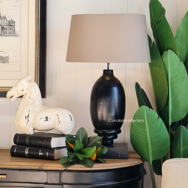 A beautiful Clemence Lamp from Canalside Interiors, perfect for adding a touch of timeless elegance to any space.