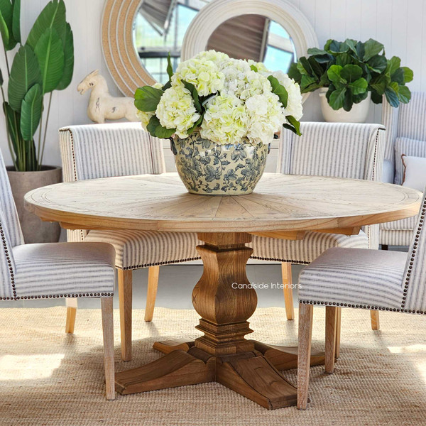 A centerpiece of craftsmanship, the Danbury Oak Parquetry Round Dining Table boasts a timeless weathered finish, perfect for Hamptons-inspired dining rooms - Canalside Interiors Sydney.