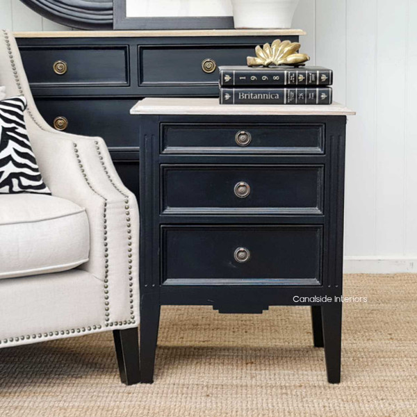 Elegant Peninsula Bedside Table featuring a black finish with a limewash top, perfect for adding coastal charm to any bedroom.