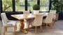 Angled perspective of the dining table, emphasizing the smooth yet rustic parquetry top and the table's versatility in decor styles