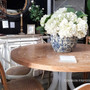 The table set in a rustic Hamptons-style dining room, illustrating its versatility and harmonious fit within various decor themes.