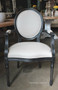In a library setting, the Sansa Carver Chair invites timeless sophistication, blending seamlessly with classical themes