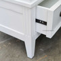 Angled shot illustrating the wardrobe's sleek design and the smooth operation of the drawer on metal runners.