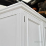 Close-up of the wardrobe's minor distressing, highlighting the attention to detail and traditional craftsmanship.