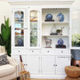 This Canalside Interiors classic, the distressed white Key Largo Display Unit, adds a touch of timeless elegance to your dining room setup