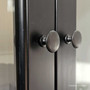 Close-up of the door hardware, demonstrating the robust and well-crafted hardware used in the Key Largo Display Unit.