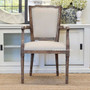 Enhance your dining area with the refined, provincial allure of the Stark Carver Chair by Canalside Interiors, finished in weathered oak and cream