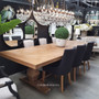 View capturing the spacious surface of the table, ideal for gatherings in a chic industrial setting.