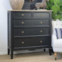 Angled view of the Peninsula 5 Drawer Chest in black with limewash top, perfect for a timeless bedroom style