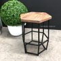 This architectural side table in distressed black adds a slick, industrial edge to bedroom decors - Canalside Interiors