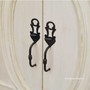 Close-up of the sideboard's handles, featuring detailed design that complements its French provincial character.