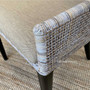 Close-up of the weave pattern, capturing the chair's artisanal quality and the subtle variations in the greywash finish.