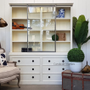 Lifestyle image of the unit in a lounge room, filled with treasured possessions for personalized decor.
