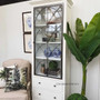 Side view showcasing the slim profile of the cabinet, ideal for adding sophistication to narrow spaces or hallways.