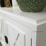 Detail-oriented point of view of the Ellery 4 Door Sideboard in white, echoing a coastal theme in the dining room - Canalside Interiors