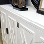 Hamptons-inspired white Ellery Sideboard, combining style and storage in a contemporary library