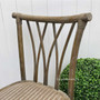 Back view of the Botanica Dining Chair in Weathered Oak, illustrating the unique diamond pattern and coastal vibe.