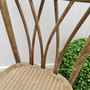 Detail shot of the chair's textured finish, emphasizing the beauty and quality of the oak timber and its easy-to-clean surface.
