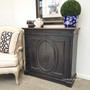 Decorative accessories atop the Marmont Sideboard, illustrating how it can be a showcase for personal collections or home accents.