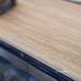 Close-up of the weathered oak top, highlighting the natural texture and depth that adds timeless appeal to the Marmont Sideboard.