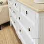 View of the sideboard's elegant handles, showcasing the attention to detail and traditional style.