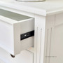 Detail of the smooth metal runners, ensuring functionality meets style with the sideboard's easy-to-use drawers.