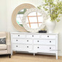 The Peninsula 7 Drawer Chest styled within a coastal-themed bedroom, offering a serene and sophisticated storage solution.