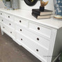 Close-up of the sideboard’s minor distressing, highlighting traditional craftsmanship and attention to detail.