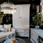 The wardrobe styled in a living room, demonstrating its perfect blend with both modern and classical decor themes.