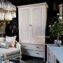 Integrated into a chic living room setup, the wardrobe elevates the space with its sophistication and storage capability.