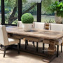 The Bridgehampton table set within a minimalist contemporary setting, emphasizing its ability to stand out as a statement piece with its unique design and traditional charm.