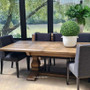 Arranged as the centerpiece in a sophisticated dining setting, ready to host a memorable dinner party.