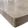 Close-up of the tableâ€™s edge, displaying the attention to detail in the parquetry work and the natural beauty of the White Cedar wood.