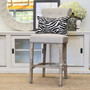 Profile shot of the stool, emphasizing its sleek design and the comfort provided by the upholstered seat and back, suitable for long, leisurely breakfasts or evening gatherings.