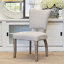 The Mimi Dining Chair in a sunlit dining room, capturing the airy and elegant vibe perfect for coastal-inspired interiors.