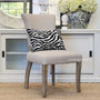 The Mimi Dining Chair paired with a modern decor, highlighting how it bridges the gap between classic and contemporary styles.