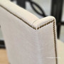 Close-up on the brass stud detailing of the Leclerc Dining Chair, highlighting the exquisite craftsmanship and attention to detail.