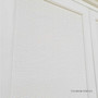 The unit captured in a bright room, showcasing its reflective quality and timeless design complementing any home style.
