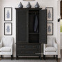 Front view of the Brielle Rattan Wardrobe Cupboard in black in situ with door open in a modern hamptons home, showcasing its sophisticated rattan detailing, storage and sleek design.