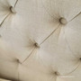 Detail shot of the buttoned back tufted detailing, embodying sophistication and timeless design.