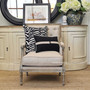 Frontal view of the Pearson Armchair in cream linen, showcasing modern elegance for the living room.