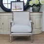 Front view of the Pearson Armchair with blue striped linen upholstery, a symbol of coastal elegance for the living room.