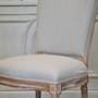 Enhance your dining setting with the Knightley Chair from Canalside Interiors, where coastal elegance meets handcrafted quality in a limewash oak frame.
