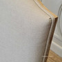 A harmonious addition to your dining room, Canalside Interiors' Knightley Chair in cream linen showcases the seamless beauty of classical craftsmanship