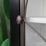 Close-up on the cabinet's hardware, showcasing the attention to detail and quality craftsmanship typical of Canalside Interiors' pieces.