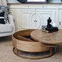 Open lid of the storage coffee table, revealing the hidden compartment in a living room | Secret Storage